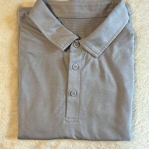 Men’s Lululemon polo. Can’t find size mark but it’s a L